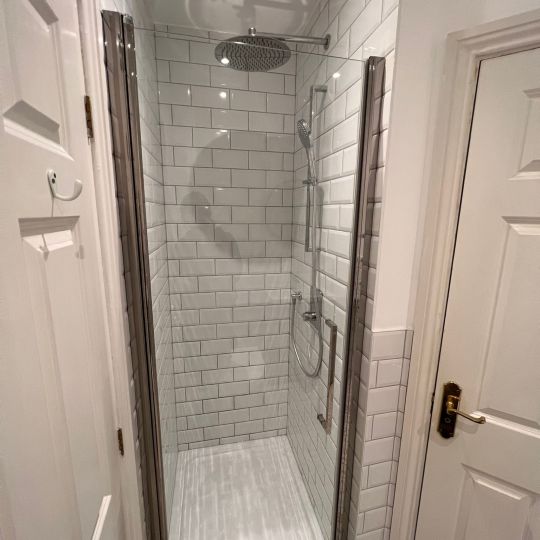 Narrow shower fitted into recess. Piha Plumbing and Bathroom Installations